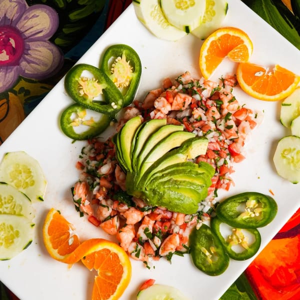 Los Magueyes Mexican Restaurant's shrimp ceviche with avocado, jalapeños, cucumbers, and orange slices.